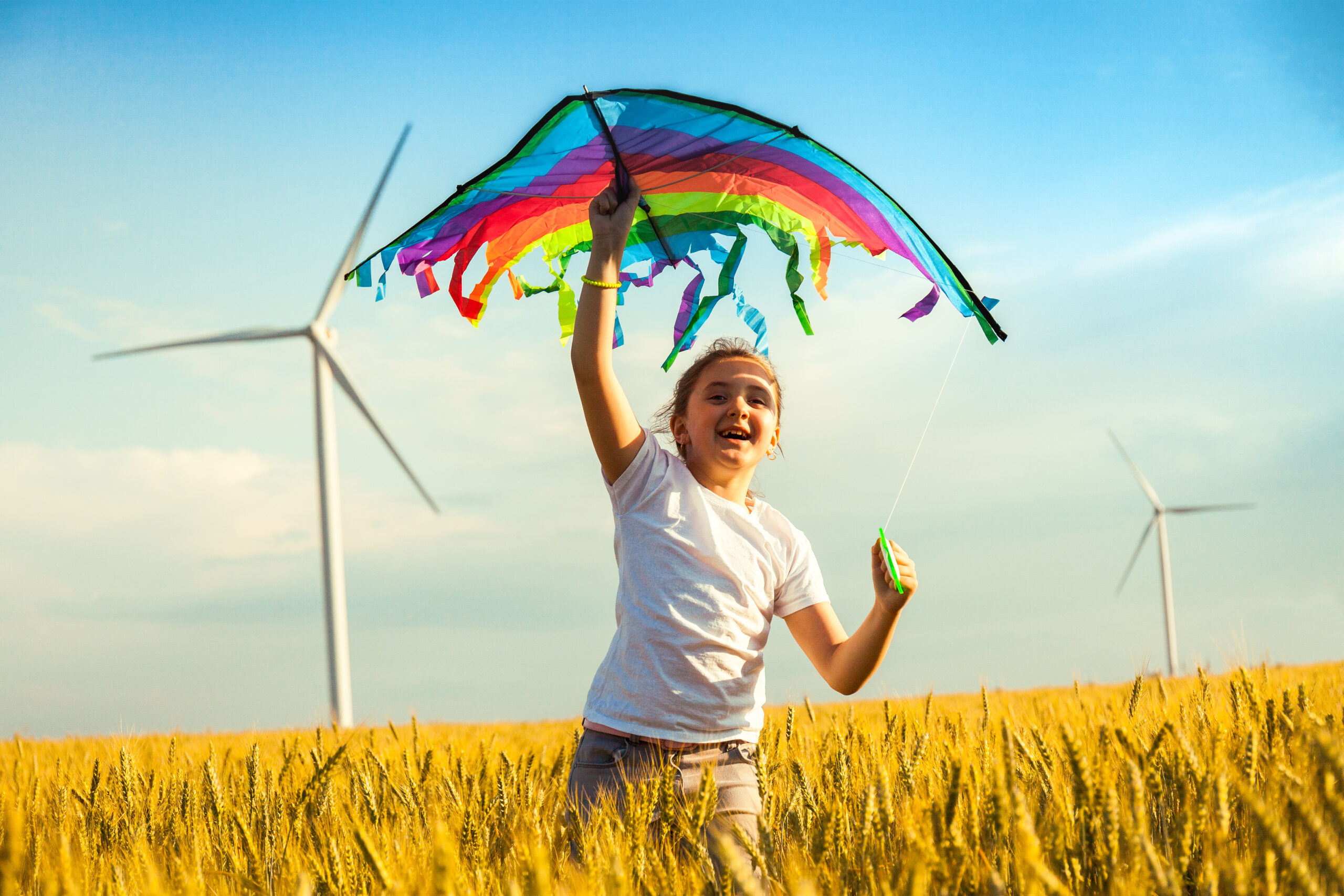 happy-little-girl-running-in-a-wheat-field-with-a-2024-12-02-02-11-39-utc-scaled.jpg