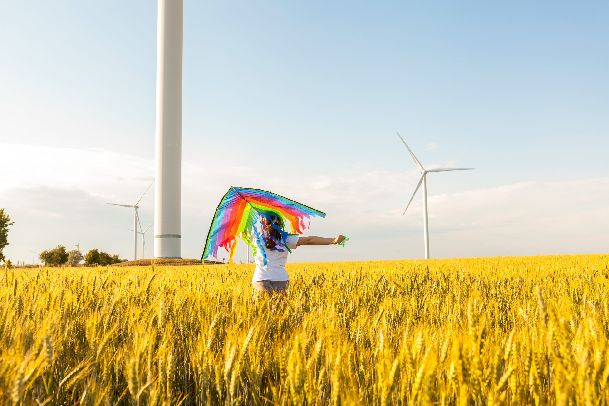 happy-little-girl-running-in-a-wheat-field-with-a-2024-12-04-02-19-19-utc-scaled.jpg